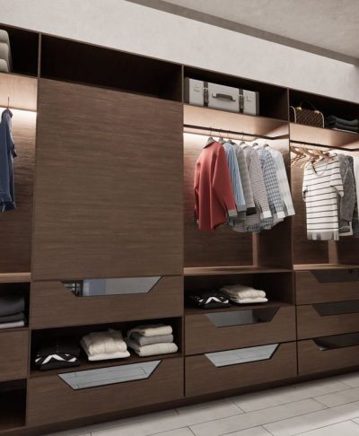 Walk-in wardrobe with warm timber cabinetry, LED lighting, and glass drawer fronts